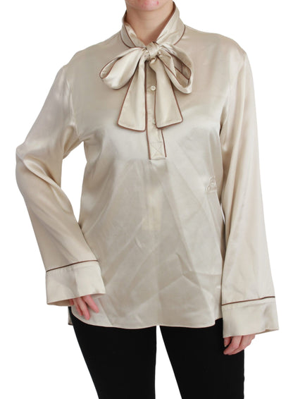 Elegante beige zijden satijnen blouse met QUEEN-borduursel