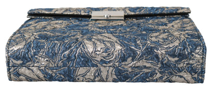 Elegante bolso de mano con estampado de cocodrilo azul