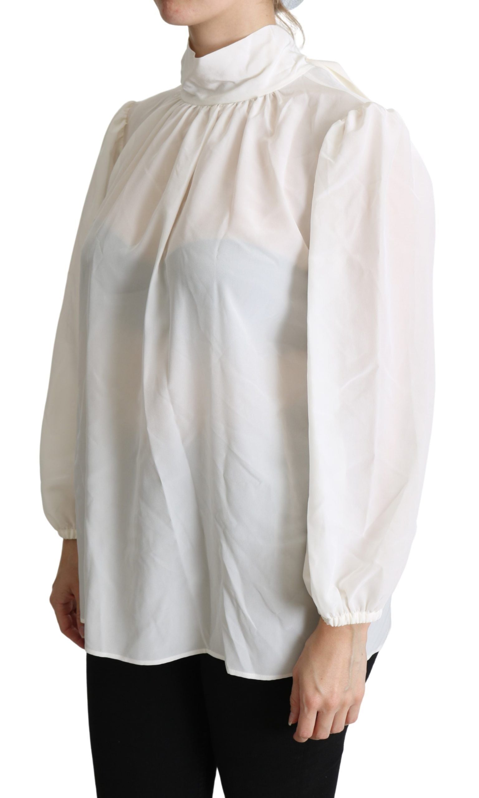 Blusa elegante con lazo de seda blanca