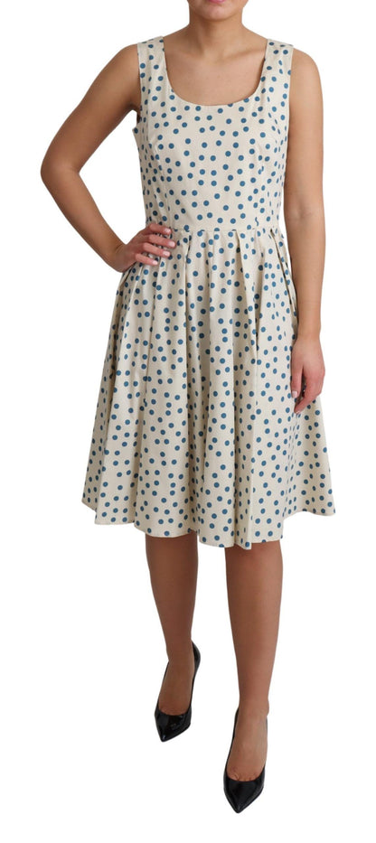 Elegante beige polkadot A-lijn mouwloze jurk