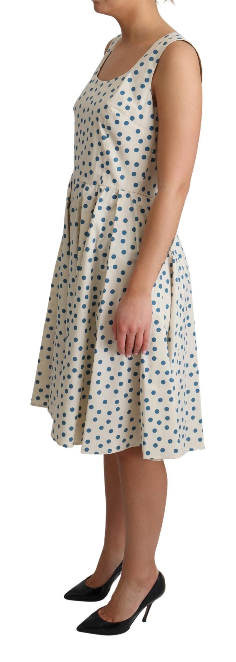 Elegante beige polkadot A-lijn mouwloze jurk