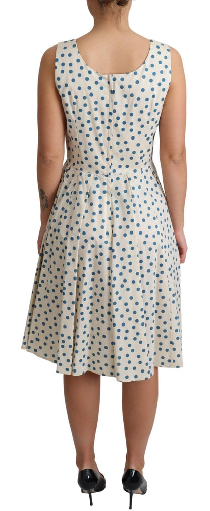 Elegante beige polkadot A-lijn mouwloze jurk