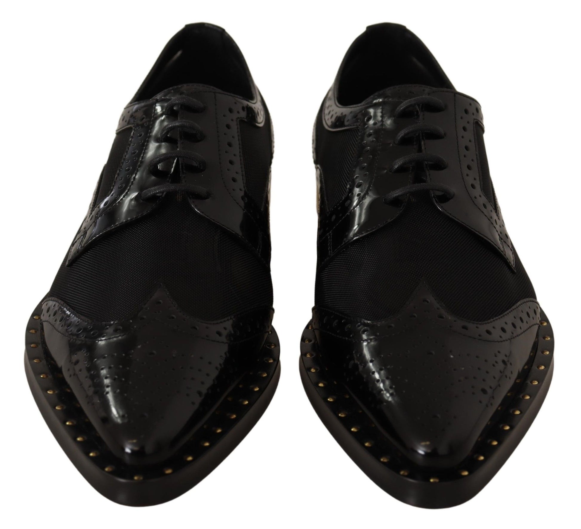 Elegantes zapatos con cordones Oxford negros con adornos dorados