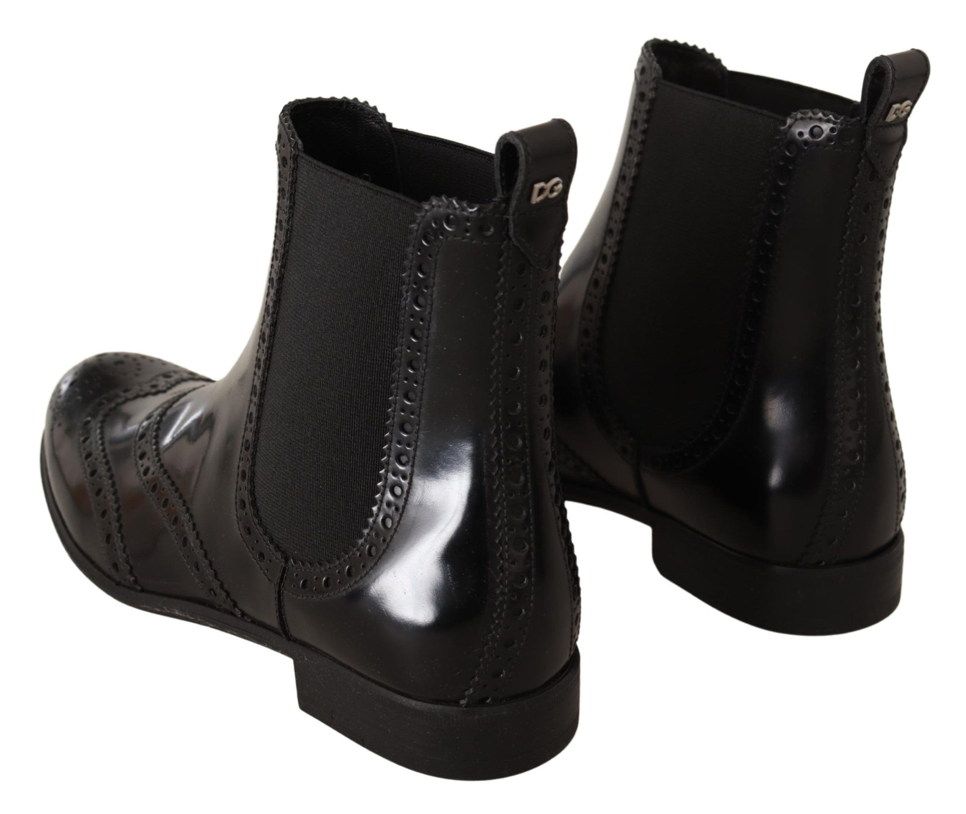 Elegantes botas Oxford negras con punta de ala en el tobillo