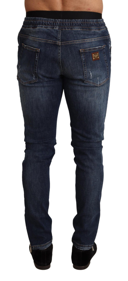 Blauwe katoenen stretch gescheurde denim jeans