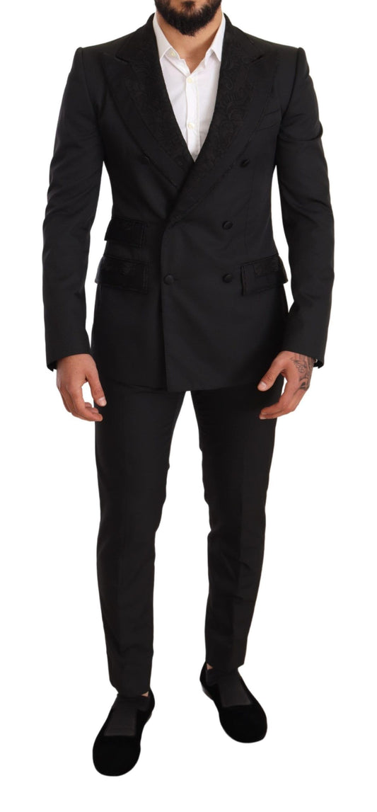 Elegante traje de brocado floral negro