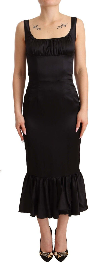 Elegante vestido tubo midi de seda negro