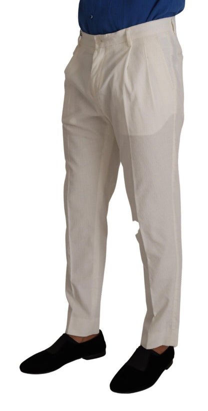 Elegantes pantalones cónicos de pana en blanco roto