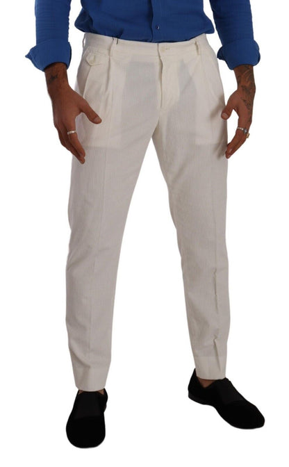 Elegantes pantalones cónicos de pana en blanco roto