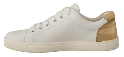 Elegante witte lederen sneakers met gouden accenten