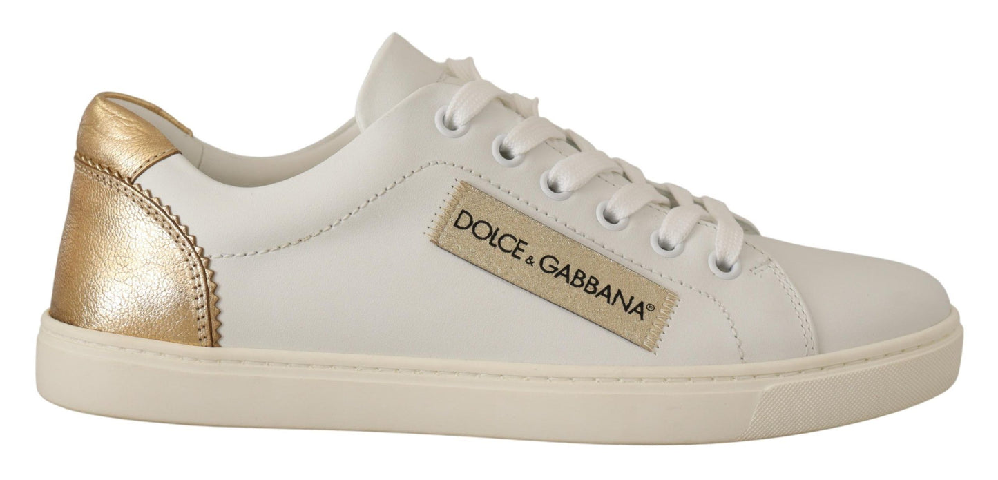 Elegante witte lederen sneakers met gouden accenten