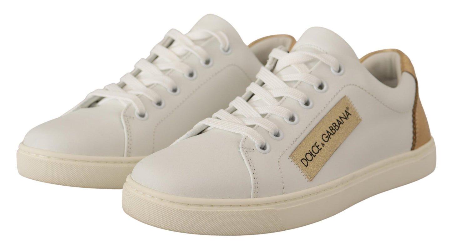 Elegante witte lederen sneakers met gouden accenten