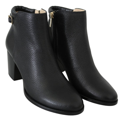 Botas de tacón de cuero negras elegantes