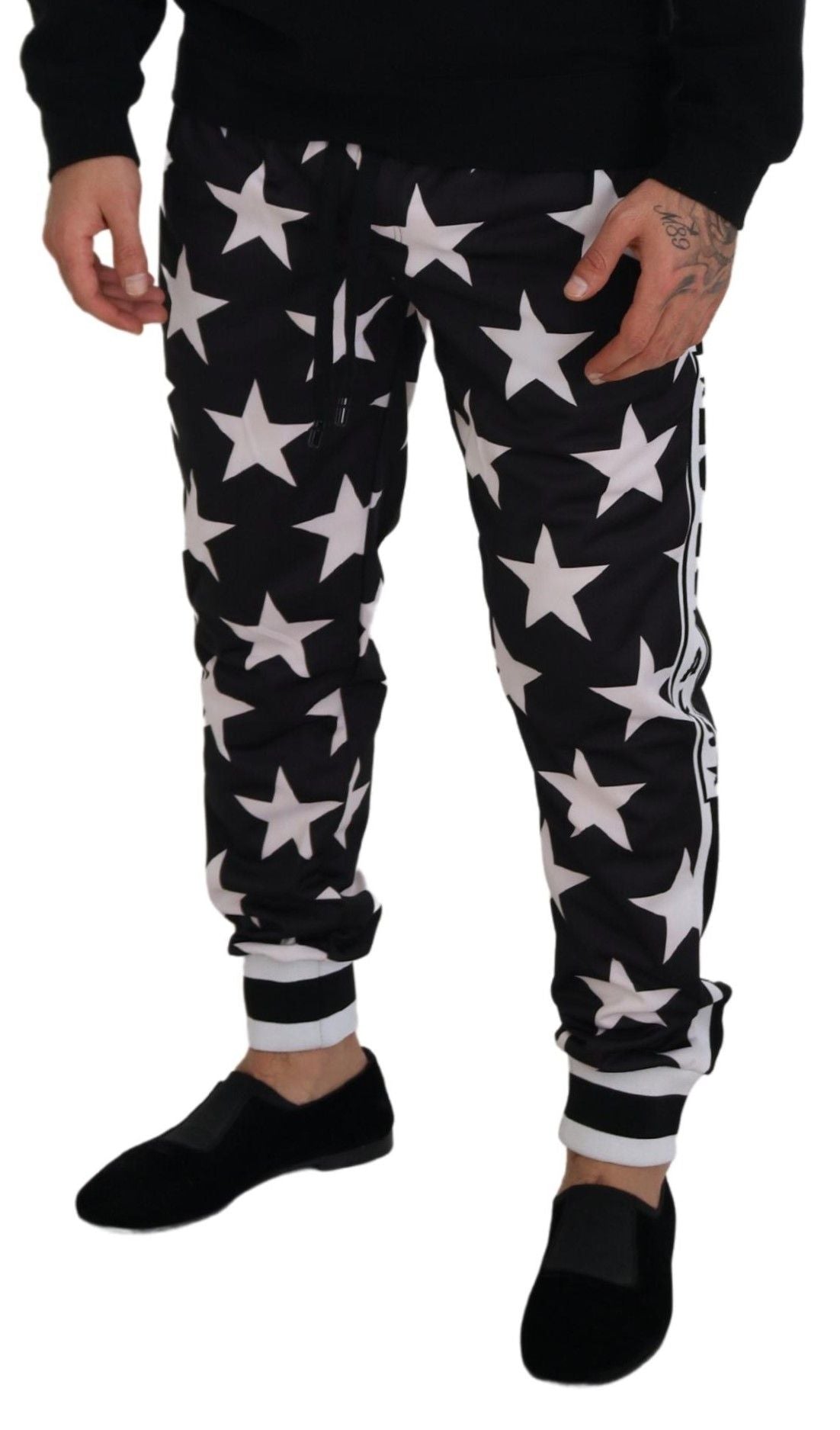 Pantalones deportivos informales con estampado de estrellas y detalle de logotipo