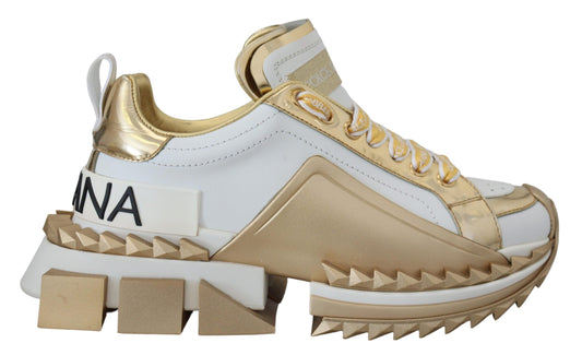 Elegante witte en gouden leren sneakers