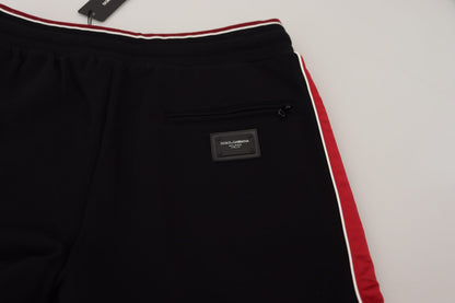 Elegante pantalón deportivo negro con detalle rojo