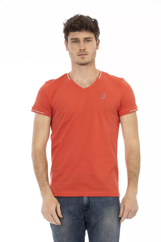 Camiseta naranja vibrante con cuello en V y estampado en el pecho