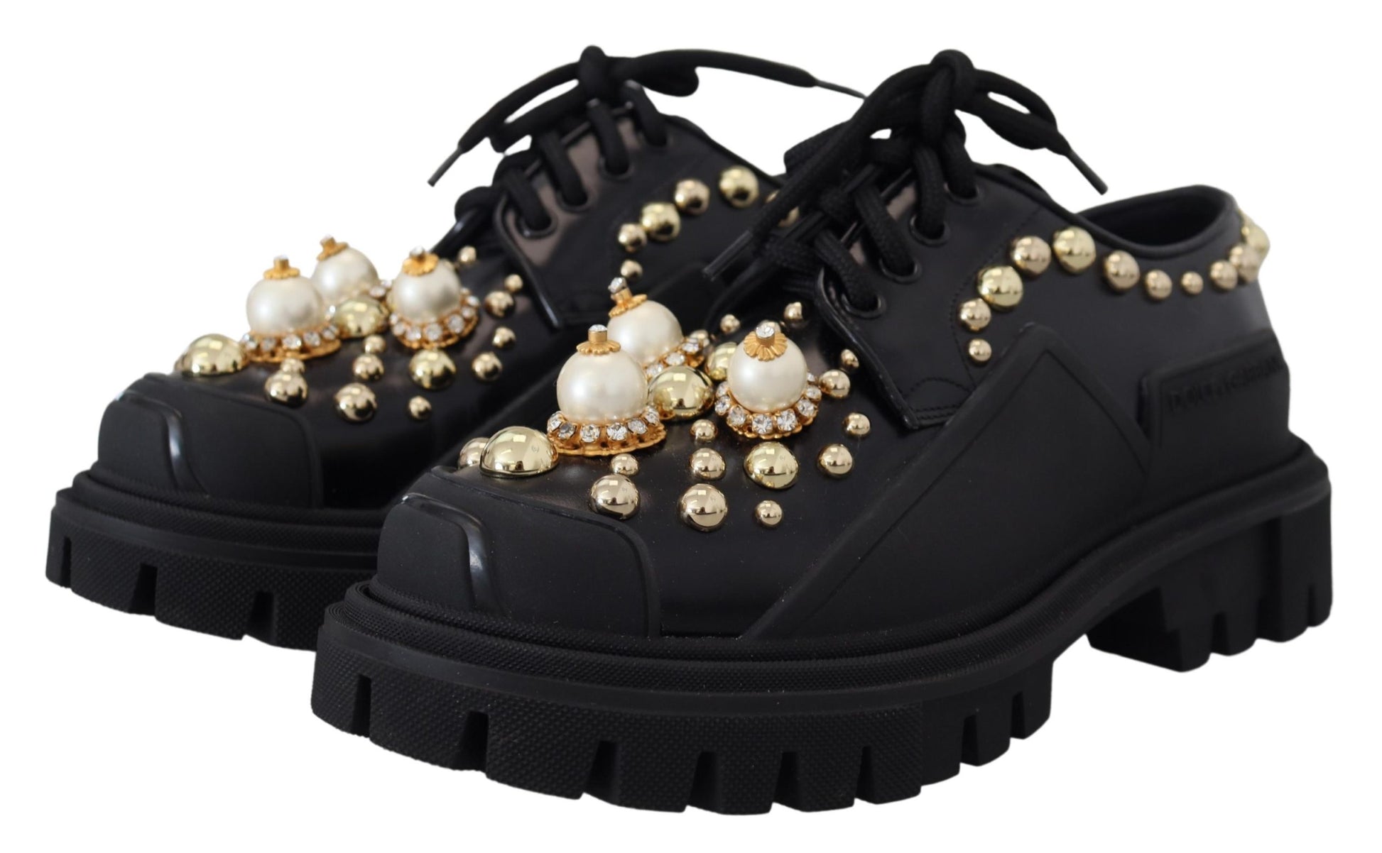 Zapatos planos Derby de cuero negro atemporales con detalles glamurosos