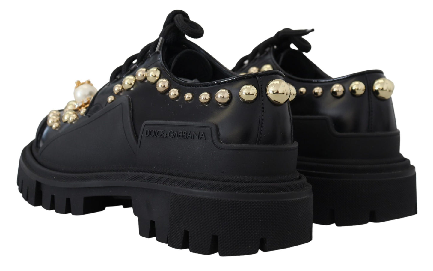 Zapatos planos Derby de cuero negro atemporales con detalles glamurosos