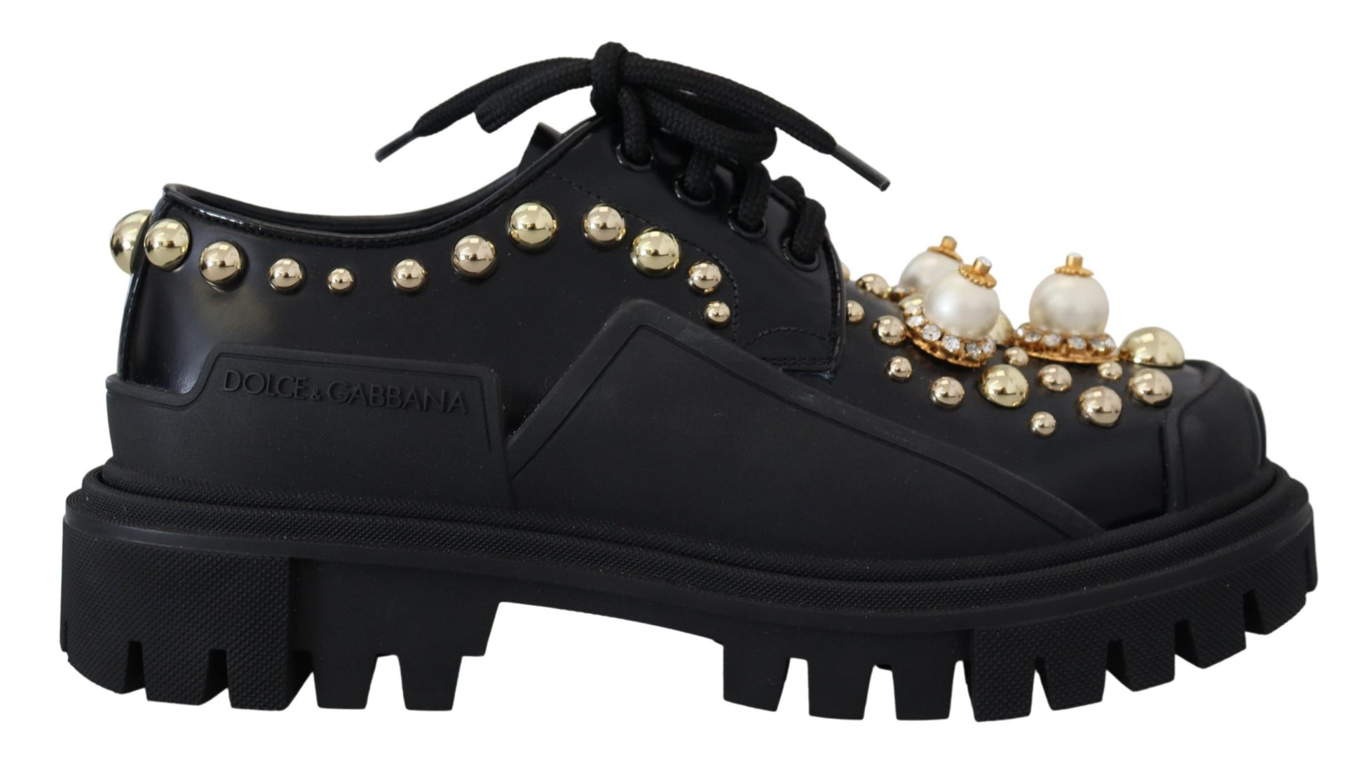 Zapatos planos Derby de cuero negro atemporales con detalles glamurosos