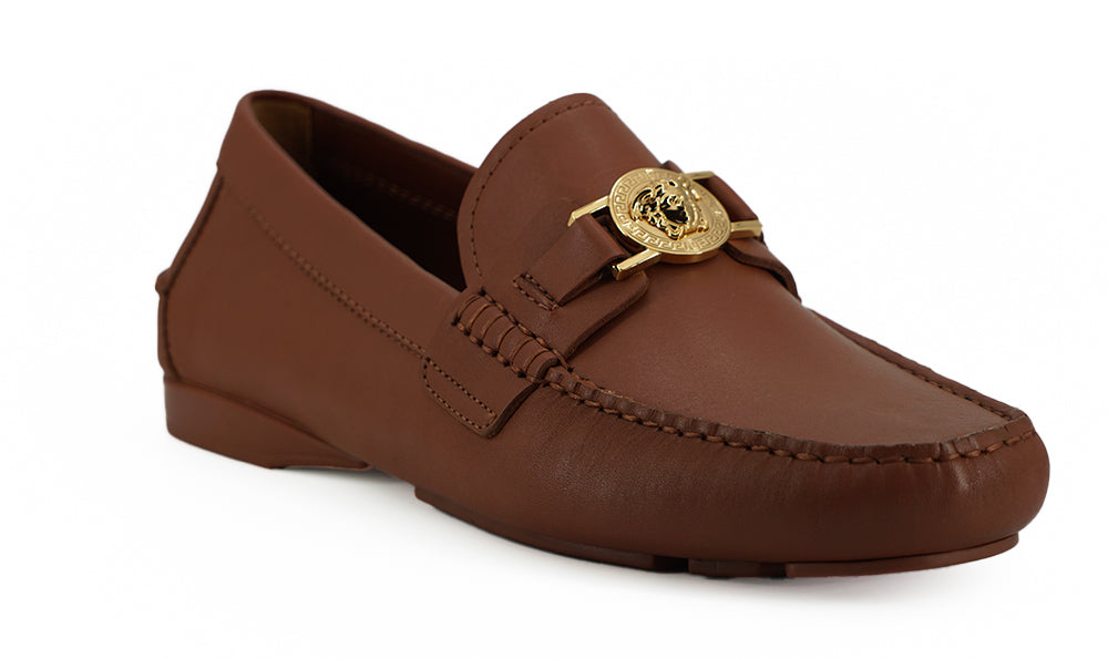 Elegante leren loafers met Medusa-reliëf