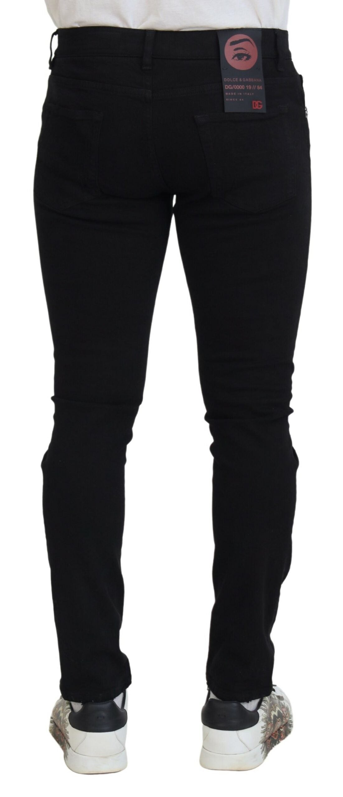 Denim negro de corte slim con harapos esbeltos