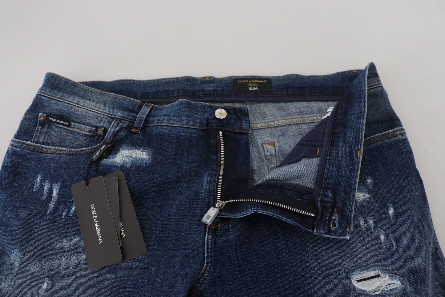 Blauwe gescheurde katoenen stretch slanke denim jeans