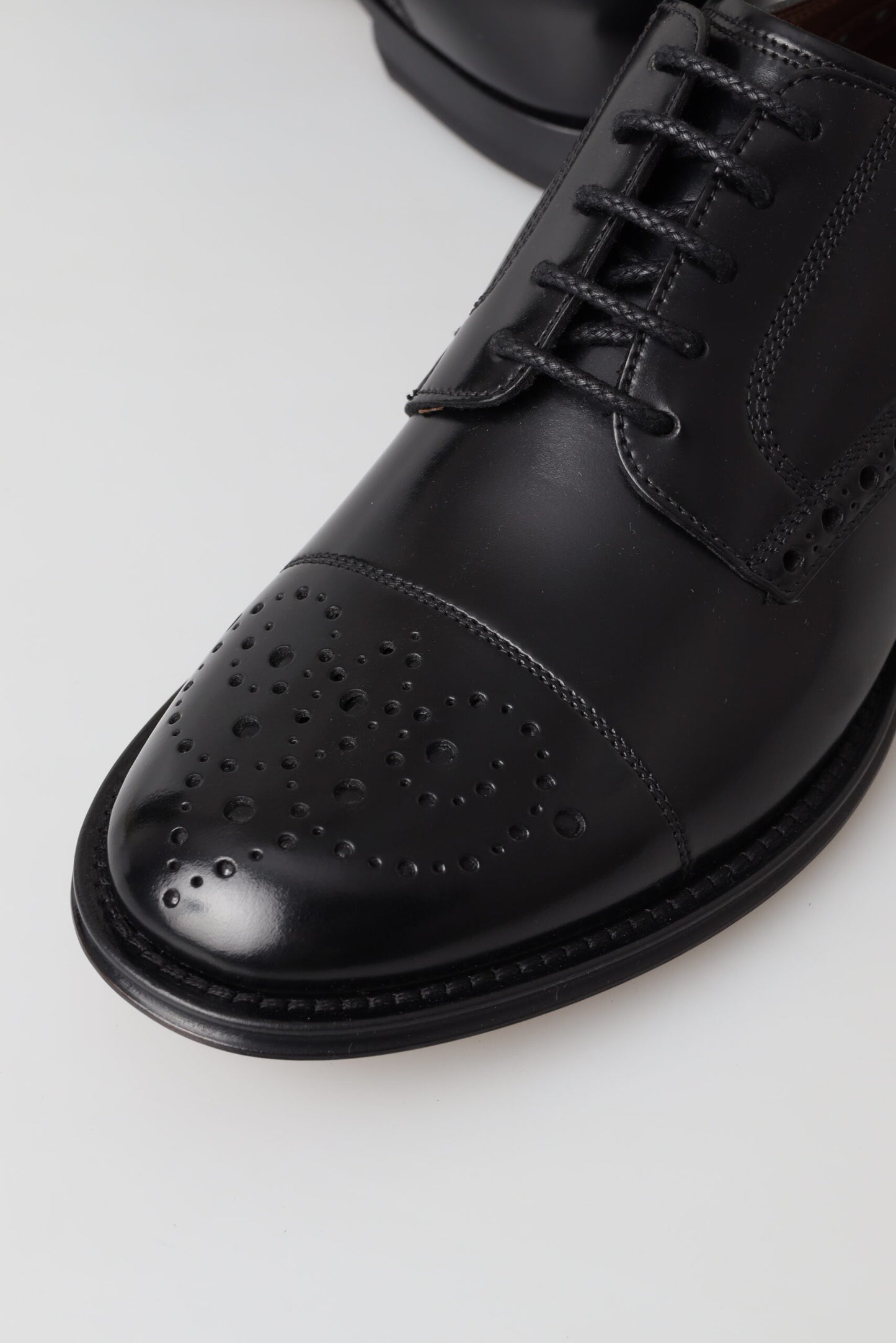 Elegante zwart lederen Oxford Wingtip-schoenen