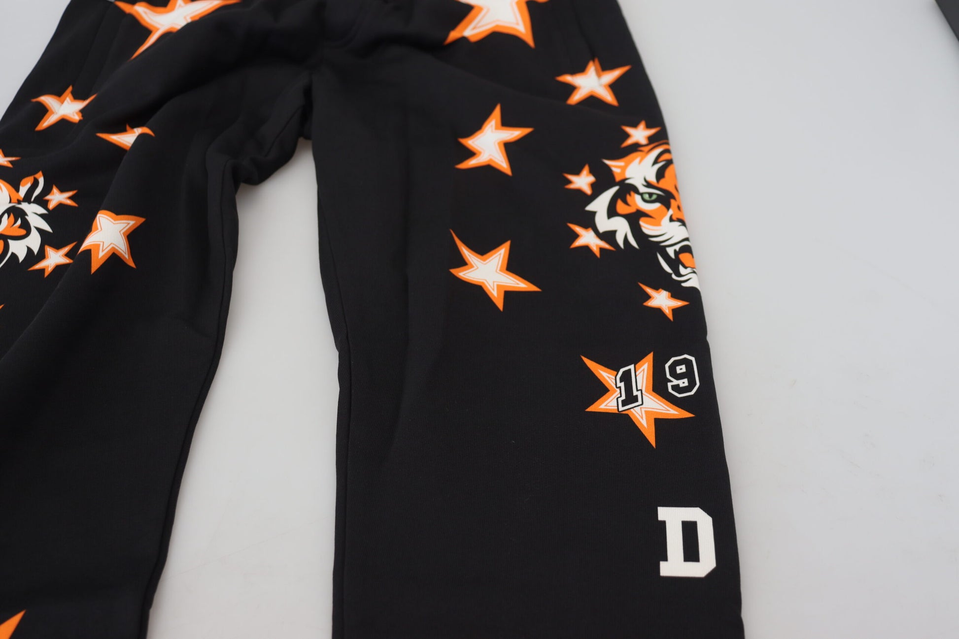 Pantalones deportivos casuales elegantes con estrella negra