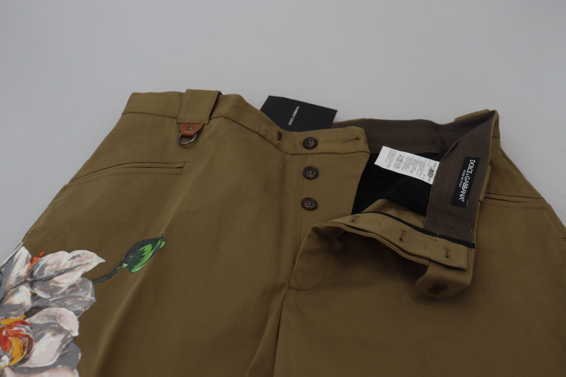 Exquisitos pantalones chinos florales en beige