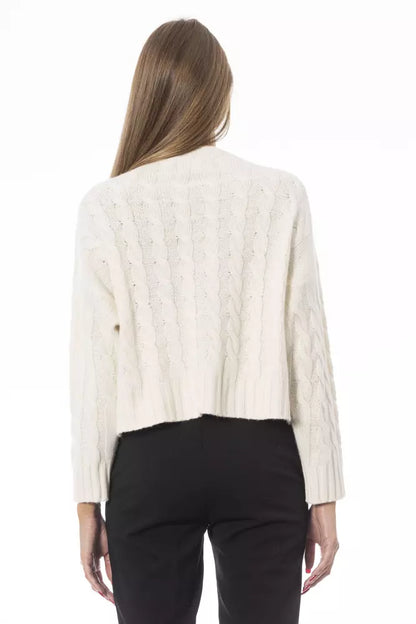 Jersey de punto acogedor con cuello redondo en beige