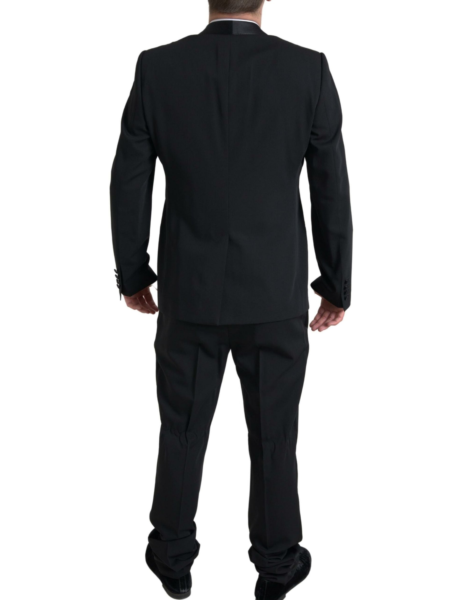 Elegante traje negro de dos piezas de corte slim