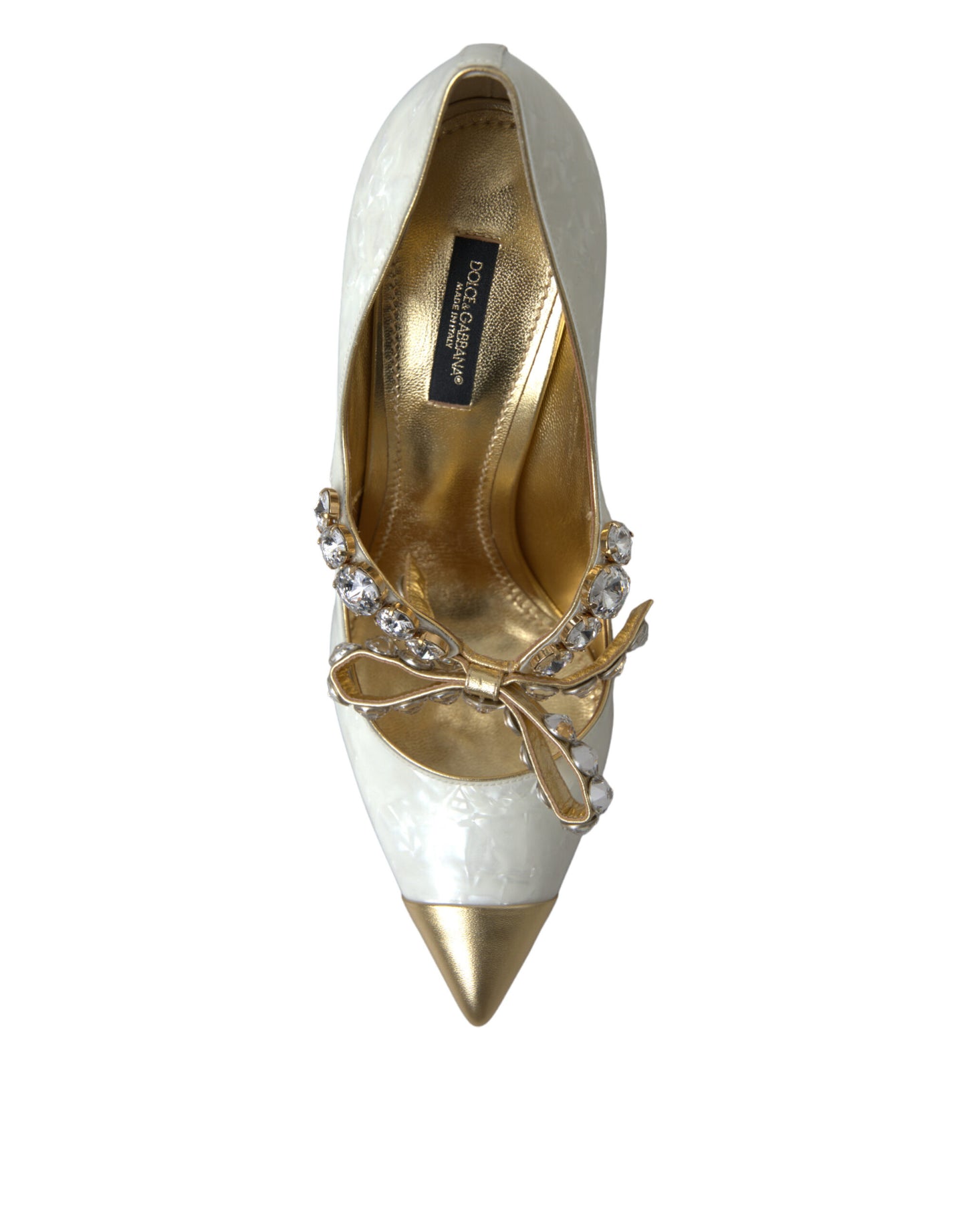 Elegantes tacones con lazo de cristal de charol blanco