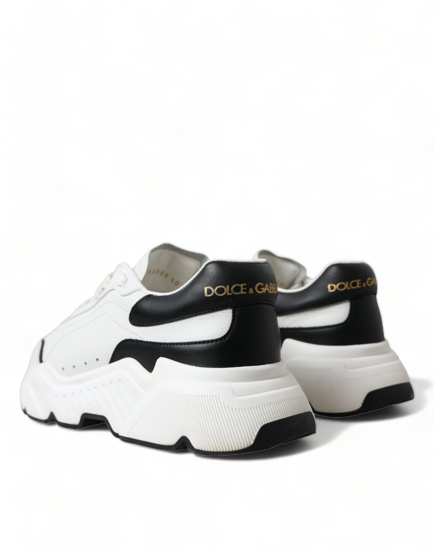 Elegantes zapatillas deportivas de cuero Daymaster en blanco y negro