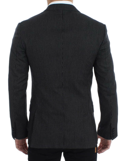 Elegante blazer de corte slim con lunares negros