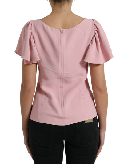 Roze blousetop met korte mouwen en ronde hals