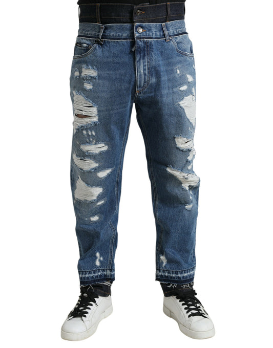 Blauwe gescheurde katoenen herendenimjeans