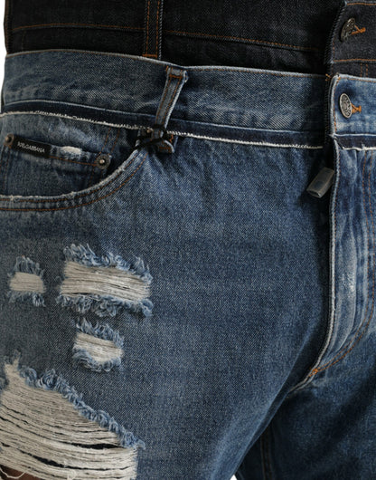 Blauwe gescheurde katoenen herendenimjeans