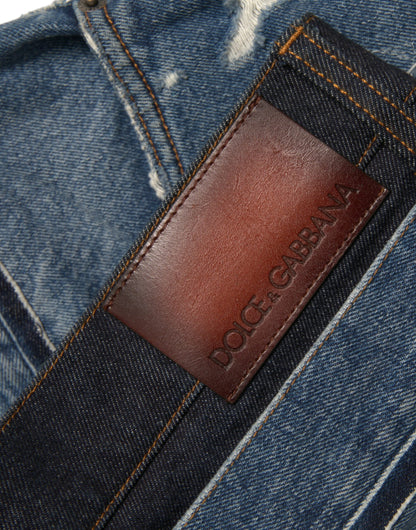 Blauwe gescheurde katoenen herendenimjeans