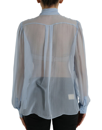 Blusa elegante de seda de manga larga