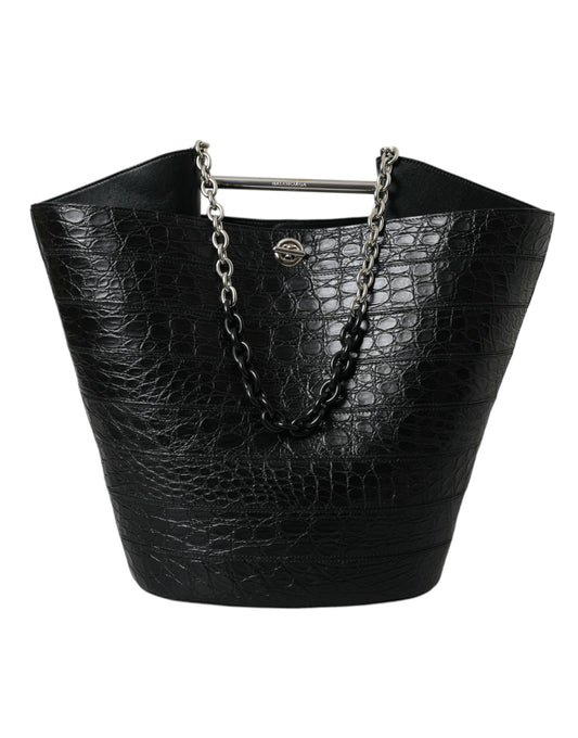 Elegante bolso tipo bombonera de piel de cocodrilo negro