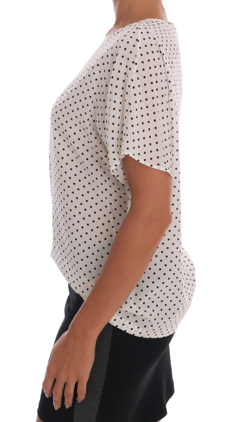 Blusa de seda elegante con lunares