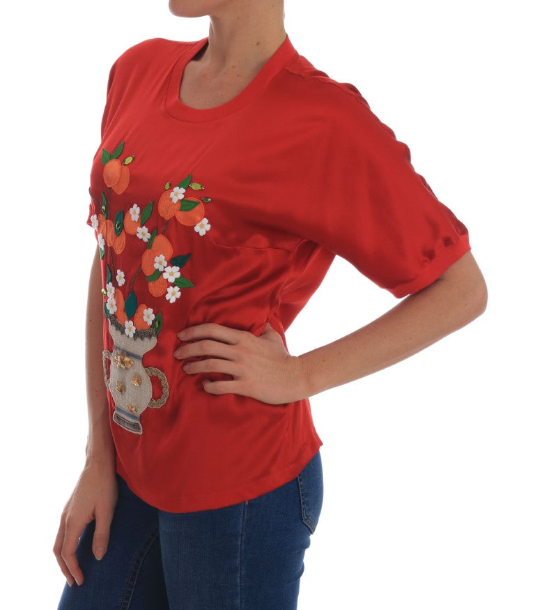 Elegante blusa de seda roja con adornos de cristales