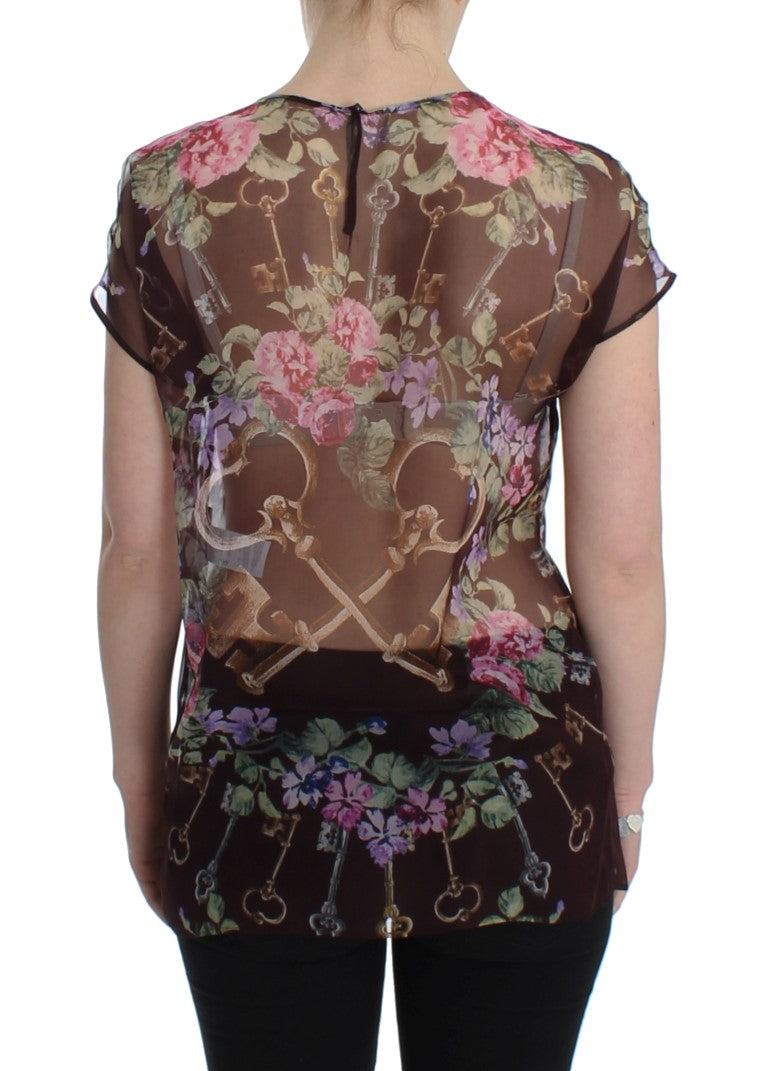 Elegante zijden blouse met bloemen en kapmouwtjes