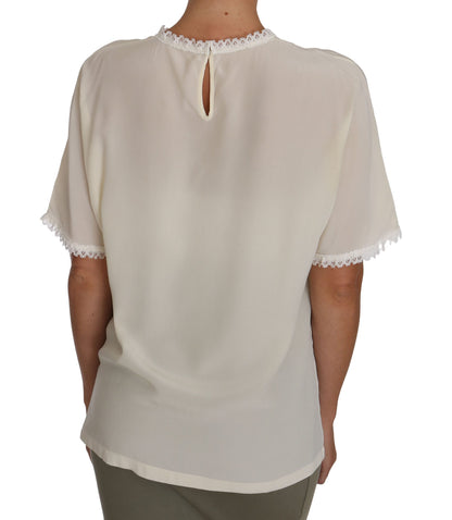 Blusa de seda color crema con detalle de encaje