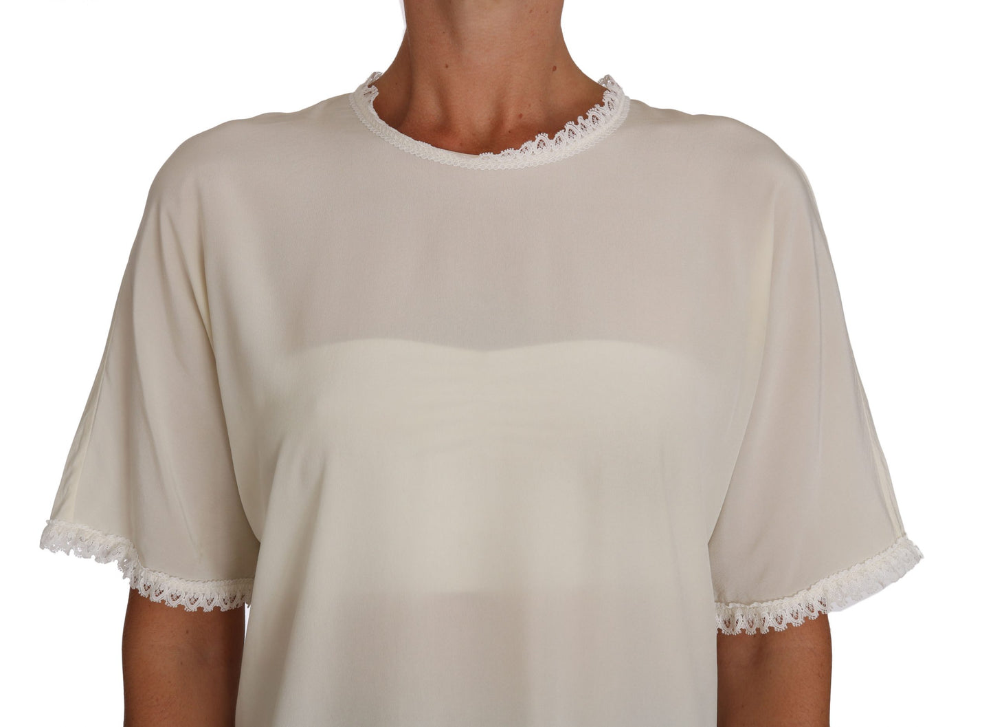 Blusa de seda color crema con detalle de encaje