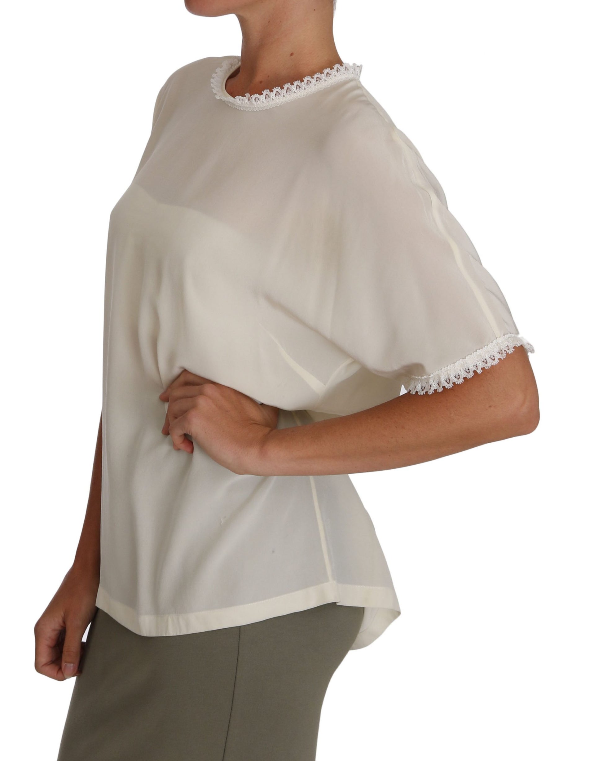 Blusa de seda color crema con detalle de encaje