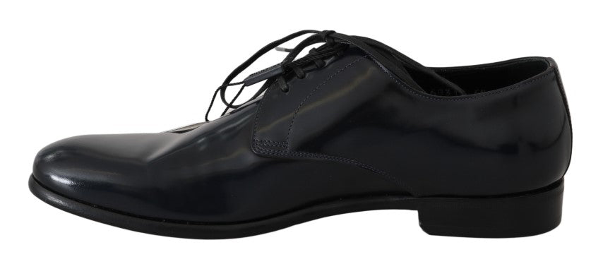 Elegantes zapatos derby de cuero azul oscuro