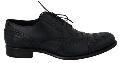 Elegantes zapatos derby con punta de ala de cuero azul