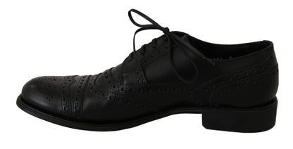 Elegantes zapatos de vestir Derby de cuero negro con punta de ala